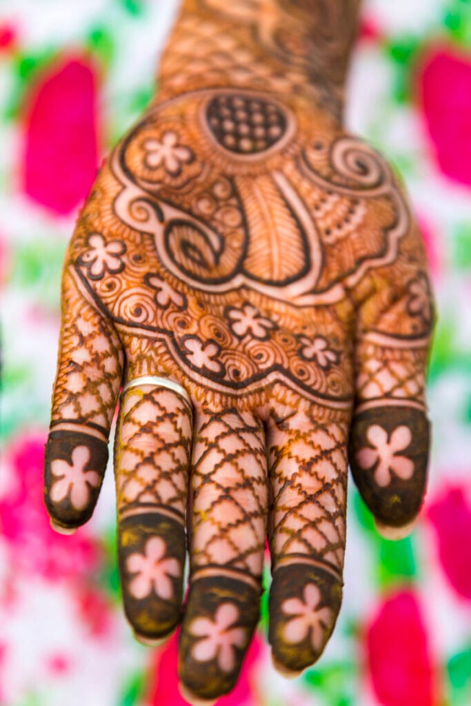 The Art and Tradition of Mehndi Design: A Journey of Beauty and Culture 10 high angle close up of female hand covered in henn 2023 11 27 05 04 58 utc 3